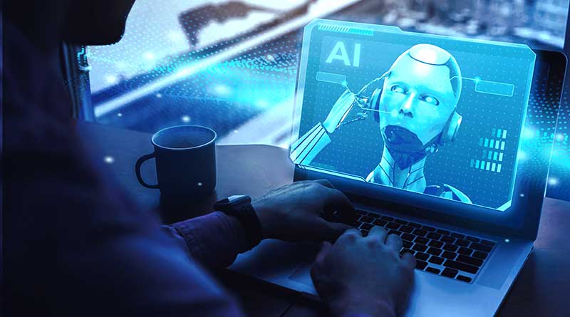 Person using laptop with artificial intelligence robot on screen
