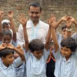 Babar Ali with a group of his students