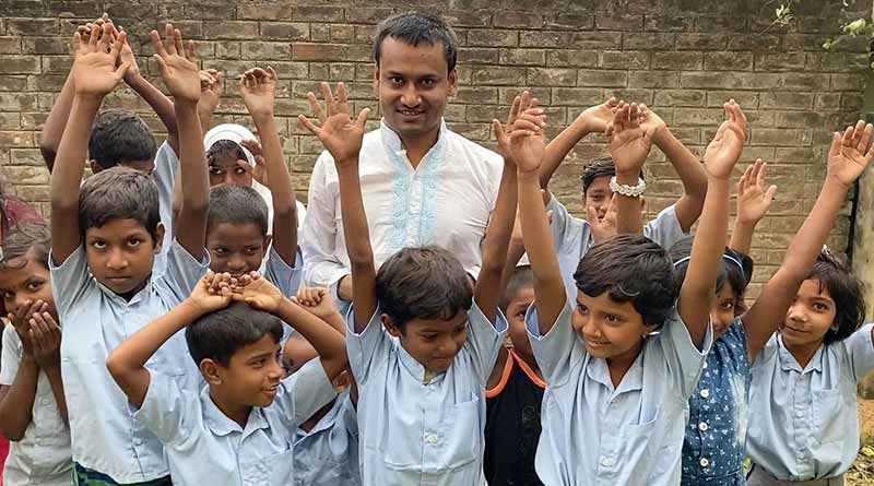 Babar Ali with a group of his students