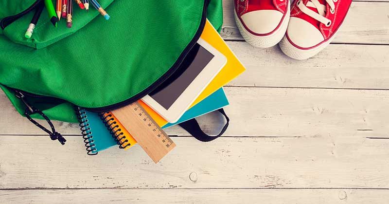 Backpack with stationery and shoes