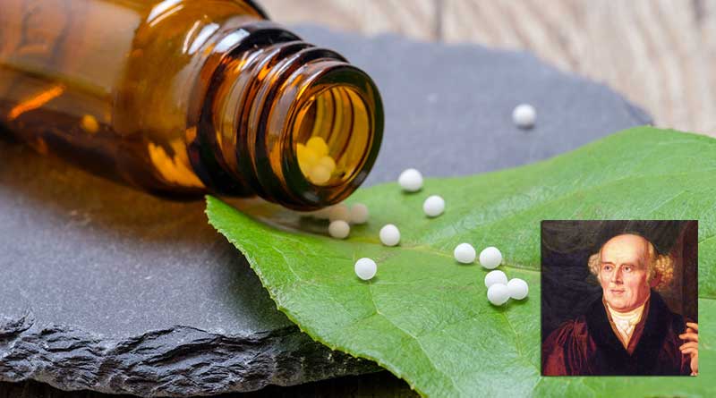 Homeopathic globules on a leaf with Christian Hahnemann in inset