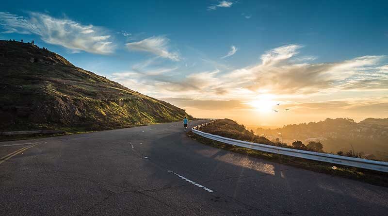 Curved road at sunset