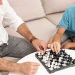 Father and son playing chess