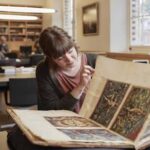Female historian in a library
