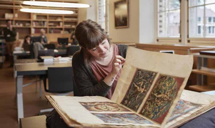 Female historian in a library