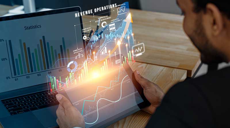 Finance analyst on laptop