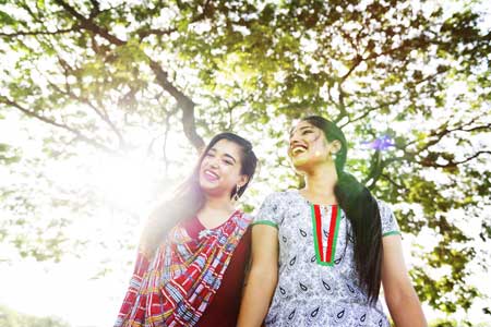 Two Indian girls walking