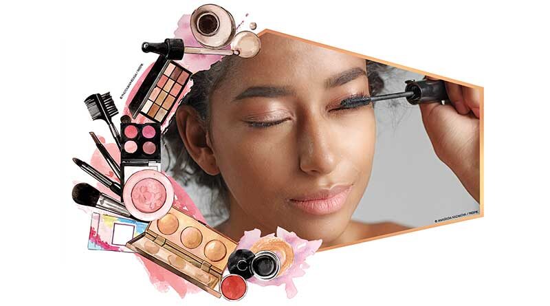 Girl putting on eyeliner with border of cosmetics.