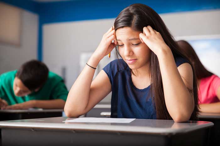 Girl looking worried at examination