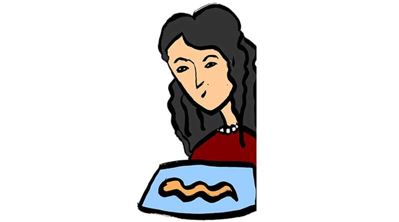Woman looking at the Greek dessert Koulourakia