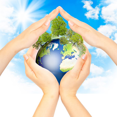 Hands and earth forming home concept