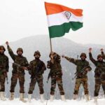 Indian Army holding the Indian flag aloft