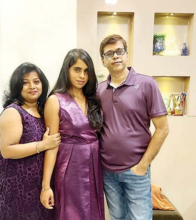 Kiara D'Souza with her parents