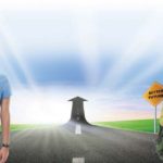 Male and female student standing on a path towards a better future