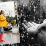Woman in yellow raincoat with umbrella smiling in the rain