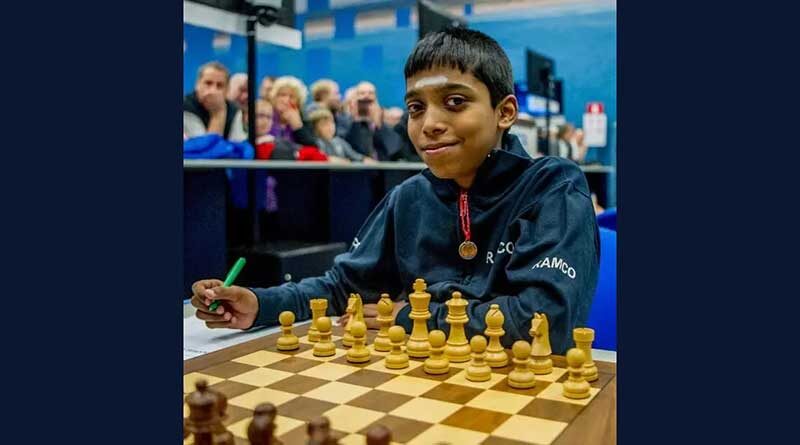 Pragganandhaa sitting near a chess board