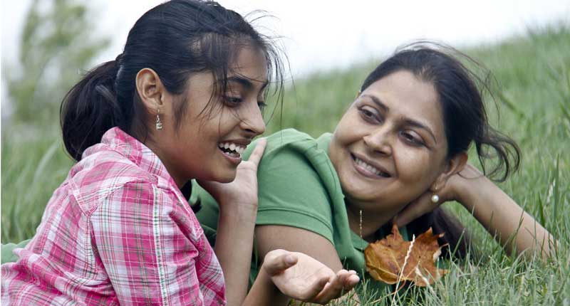 Mother and daughter speaking to each other with respect