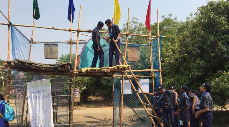 Scouts constructing a platform