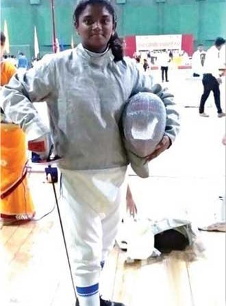 Siddhi Misal in her fencing gear