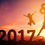 Silhouettes of two people happy for new year 2018
