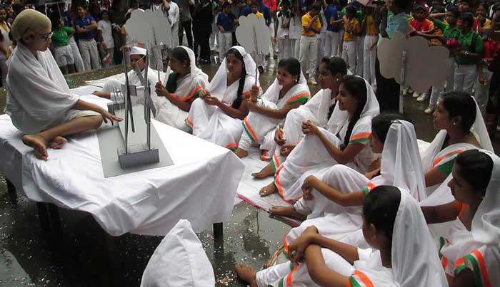 Students acting as Gandhi and his followers