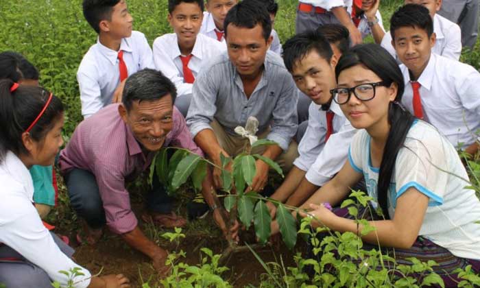 Students of Newman School, Changlang, Arunachal planting saplings