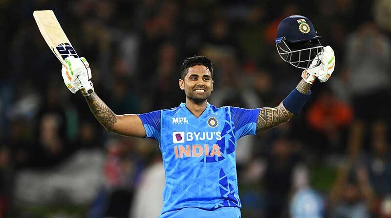 Surya Kumar Yadav holding up his helmet and bat