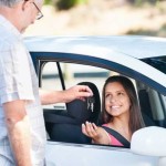 Teen getting car keys from father