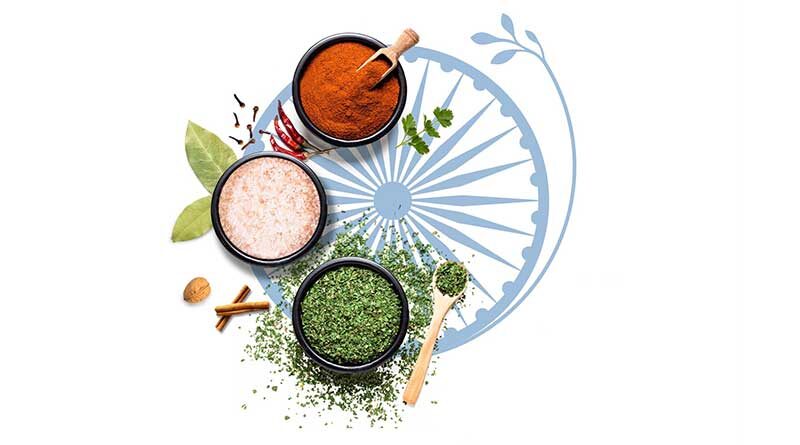 Indian flag chakra with bowls of tricolour spices