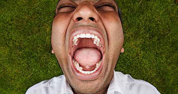 Vijay Kumar displaying his teeth