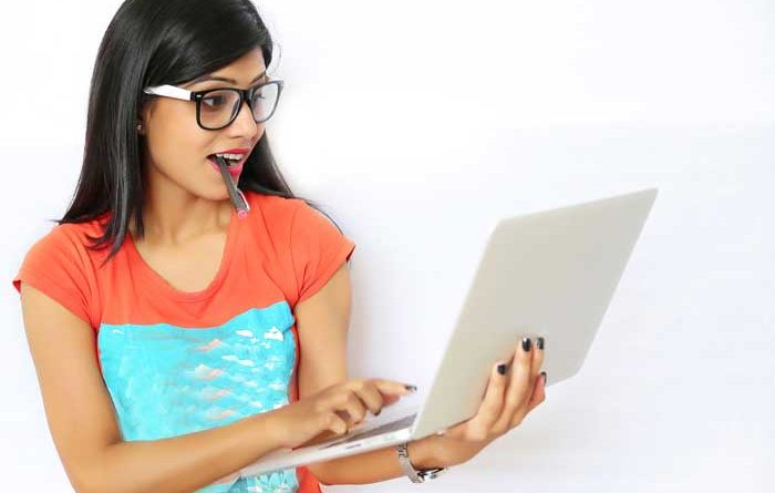 Young female student working on a laptop