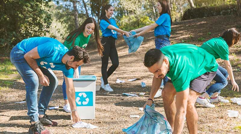 Youth picking up trash and litter