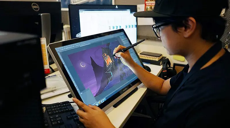 Young man working on animation