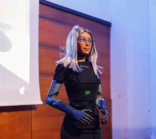 Mika, the world's first humanoid robot CEO giving a presentation