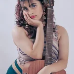 Trish-A with a guitar