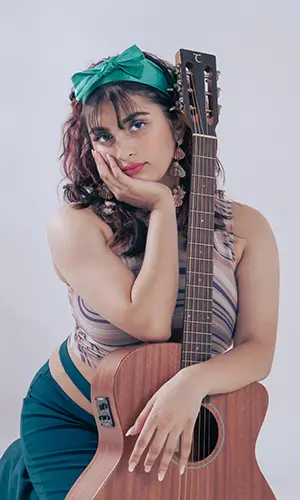 Trish-A with a guitar