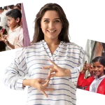 Young woman using sign language while smiling